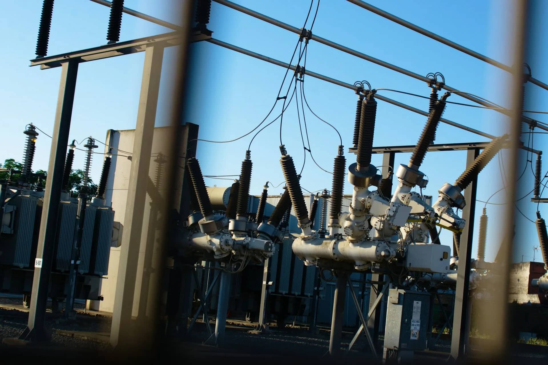 Electrical substation and power lines at dusk